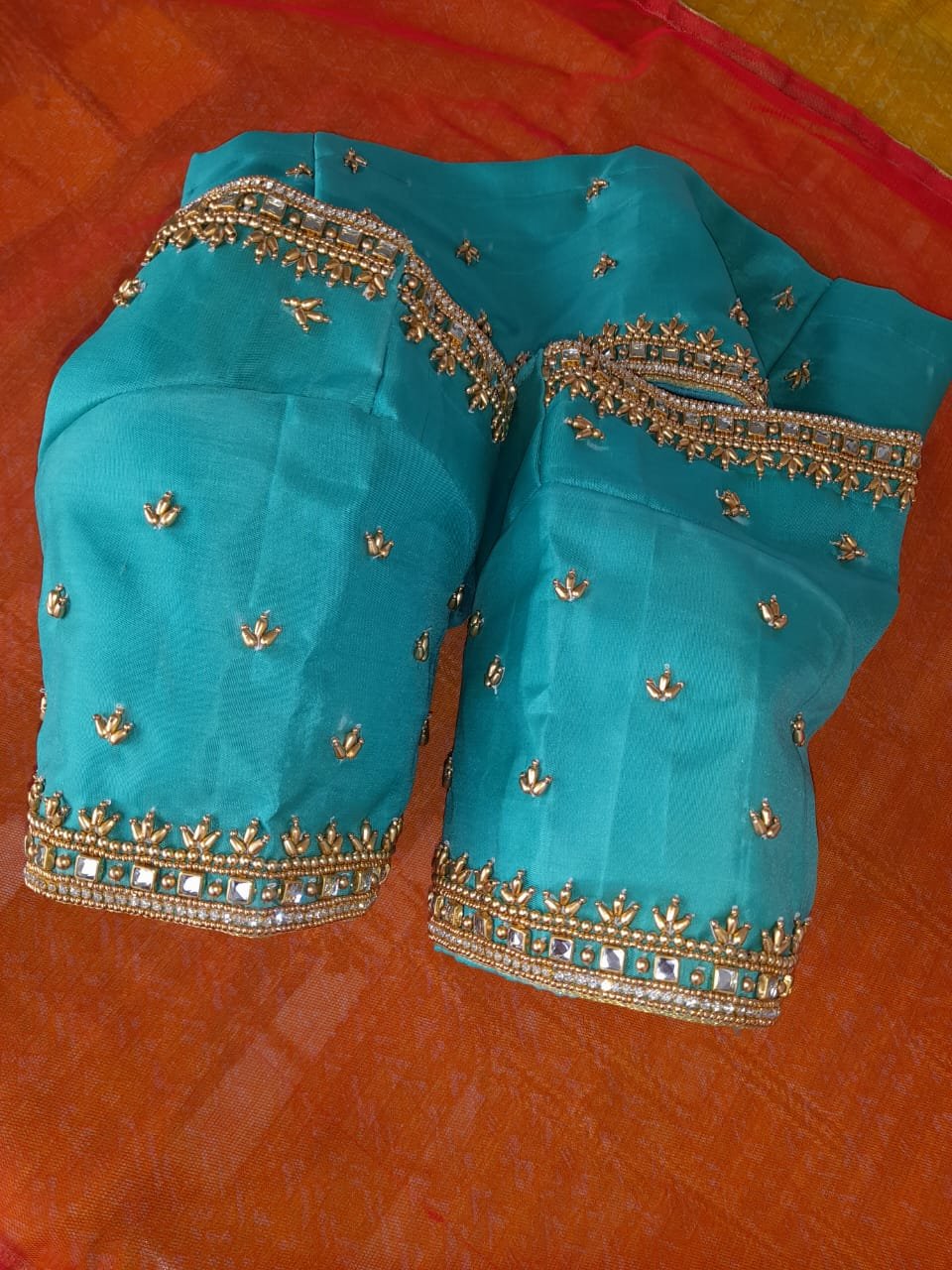 Kundan stone elbow sleeve maggam work with fine resham silk details